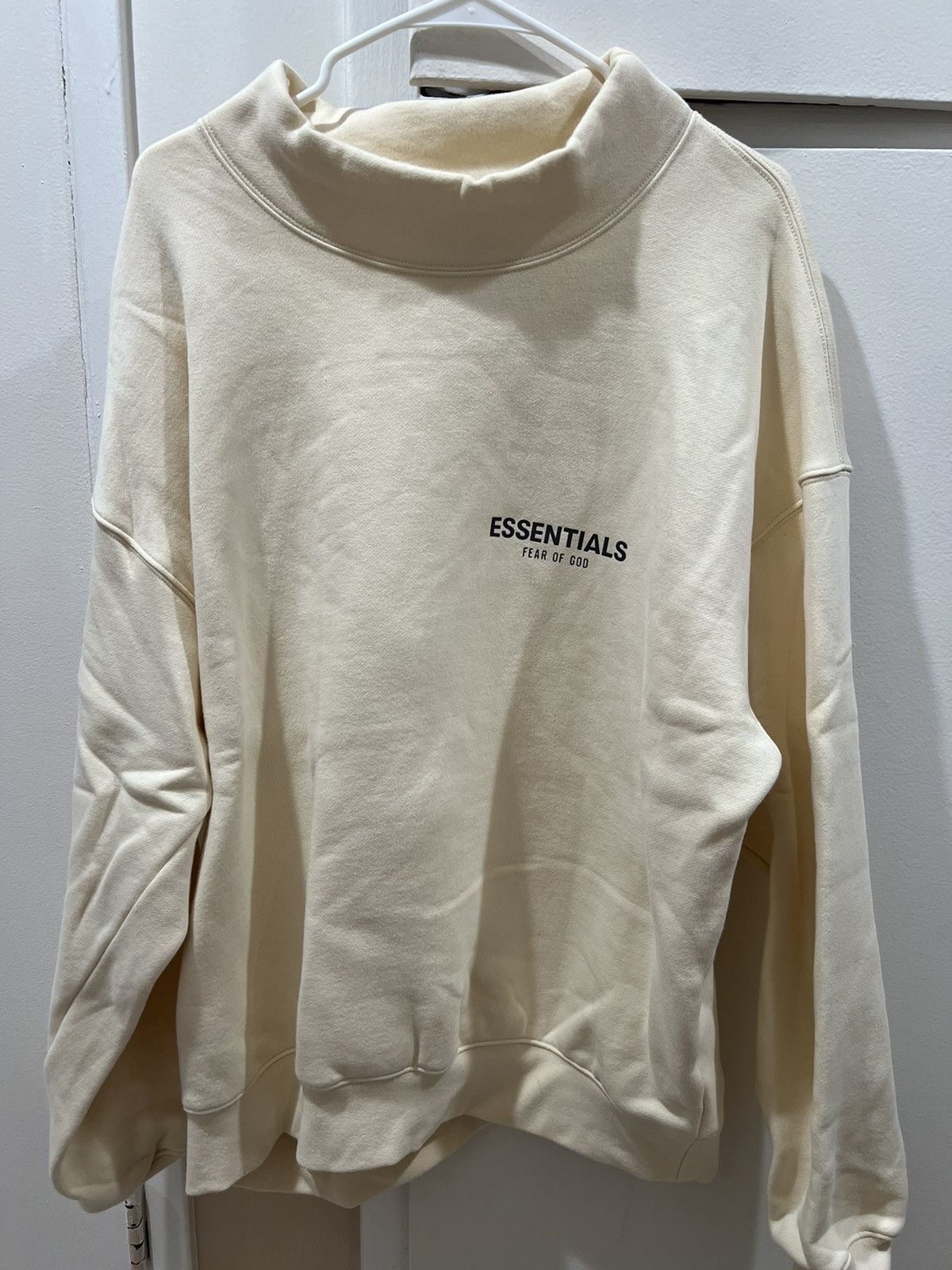 Fear of god store Essientials cream mockneck sweatshirt