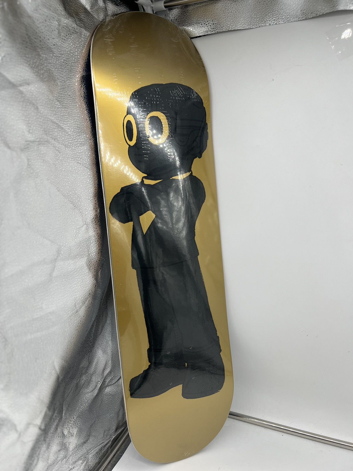 image of Hebru Brantley The Great Debate Deck Gold Skateboard Black, Men's