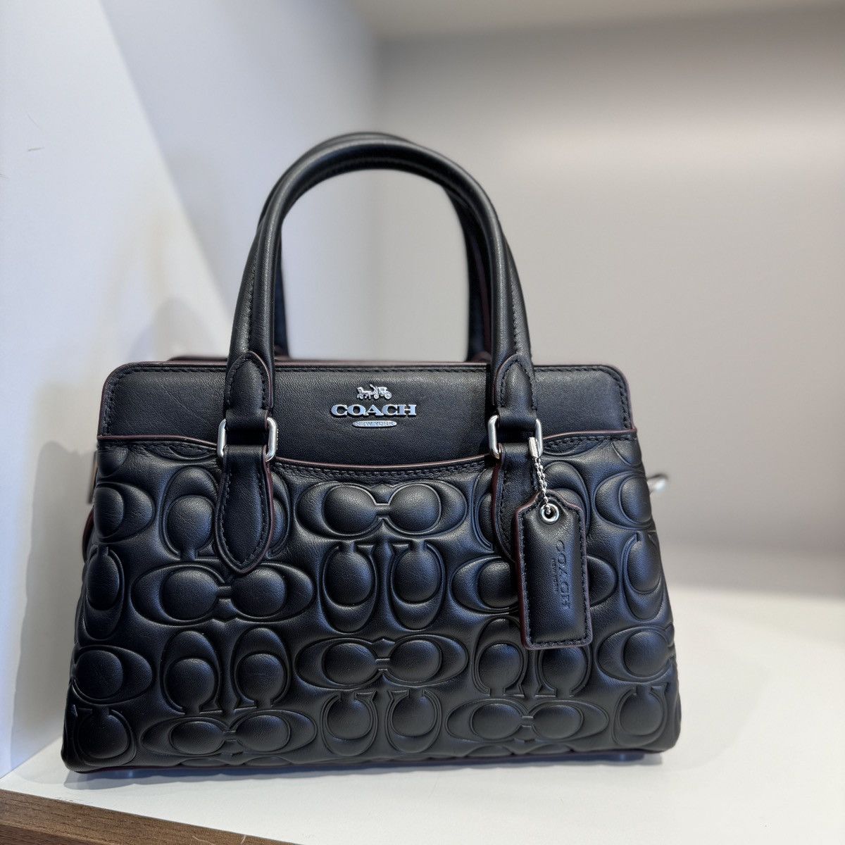 image of Coach Mini Darcie Carryall With Signature Leather Cm050 in Black, Women's
