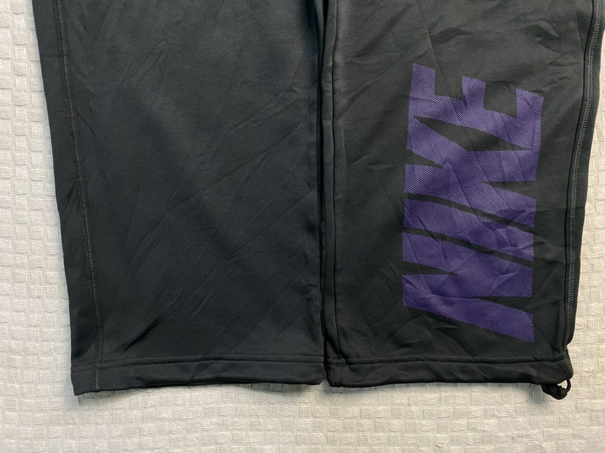 Nike × atmos VINTAGE NIKE 90S BAGGY NYLON WIDE LEG SWOOSH TRACK PANTS Y2K Size US 30 / EU 46 - 7 Thumbnail