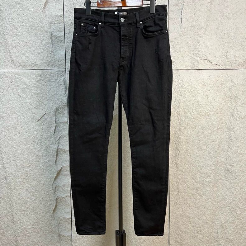 Amiri black solid color destruction casual denim pants
