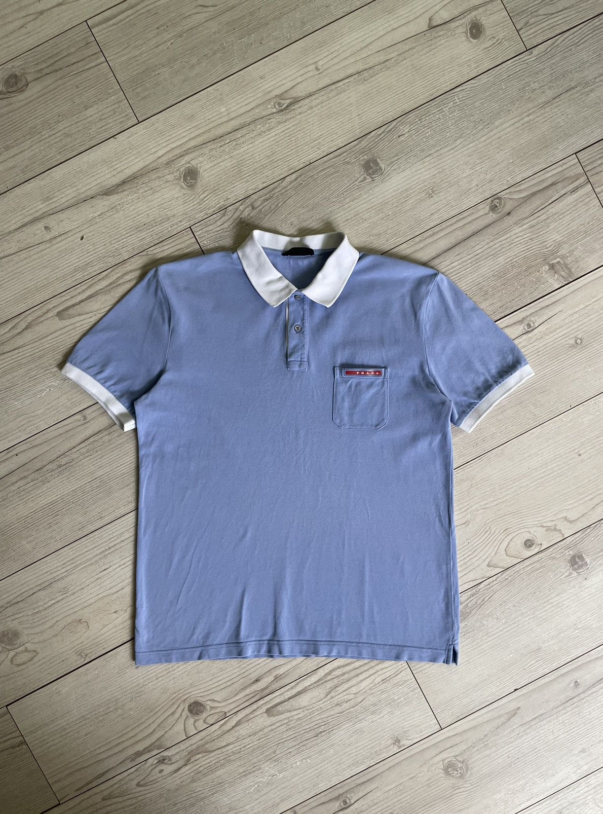 image of Prada Milano Red Tab Logo Polo Shirt in Blue, Men's (Size 2XL)