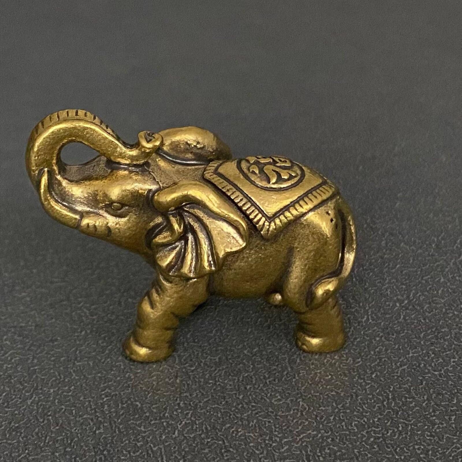 The Unbranded Brand Small Brass Elephant Figurine with Decorative Saddle Size ONE SIZE - 1 Thumbnail