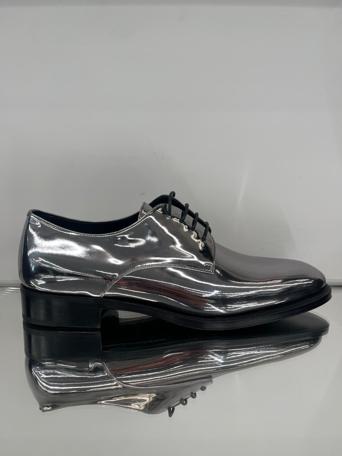 ADRIEN Deries in Laminated Metal
