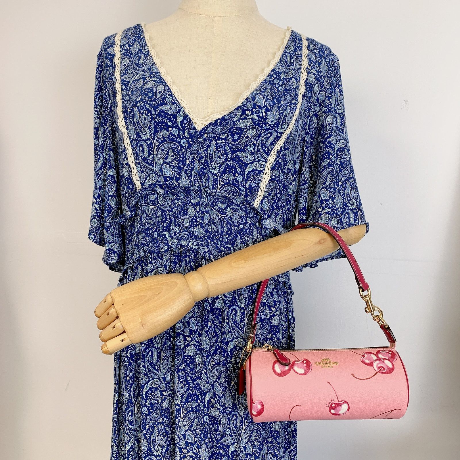 image of Coach Cr371 Nolita Barrel Bag With Cherry Print In Flower in Pink, Women's