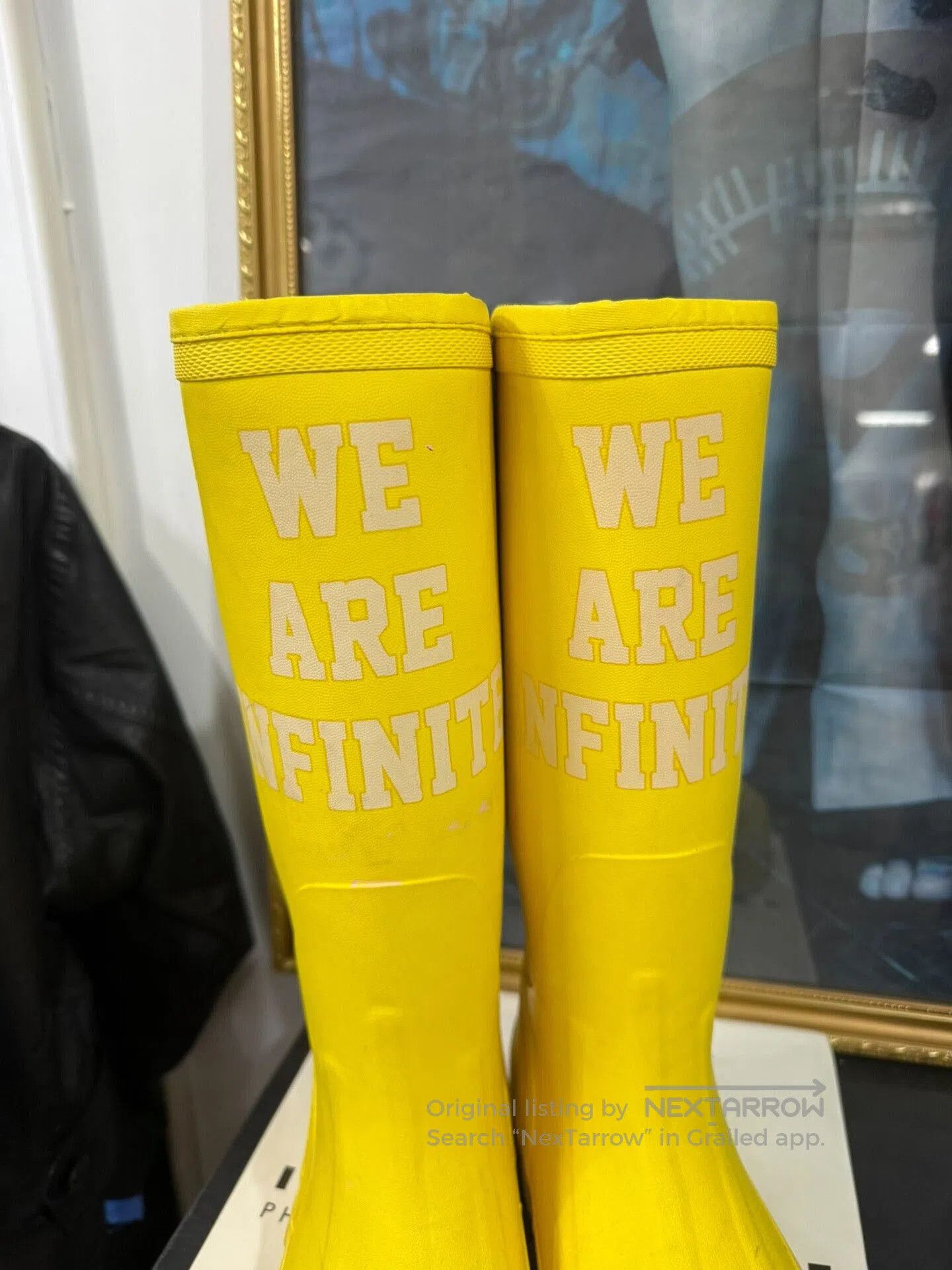 undercover we are infinite rain boots.