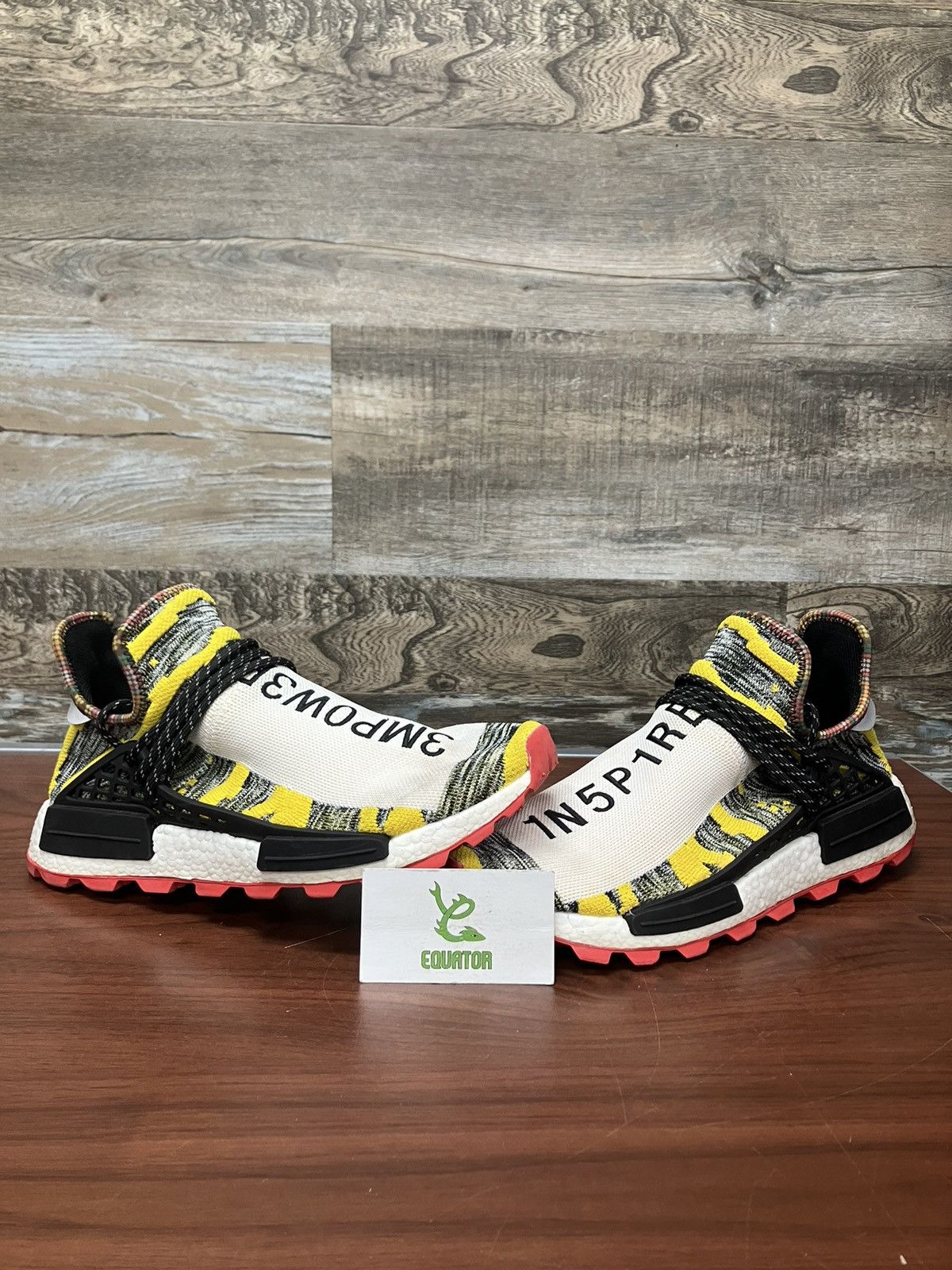 nmd hu pharrell solar pack orange