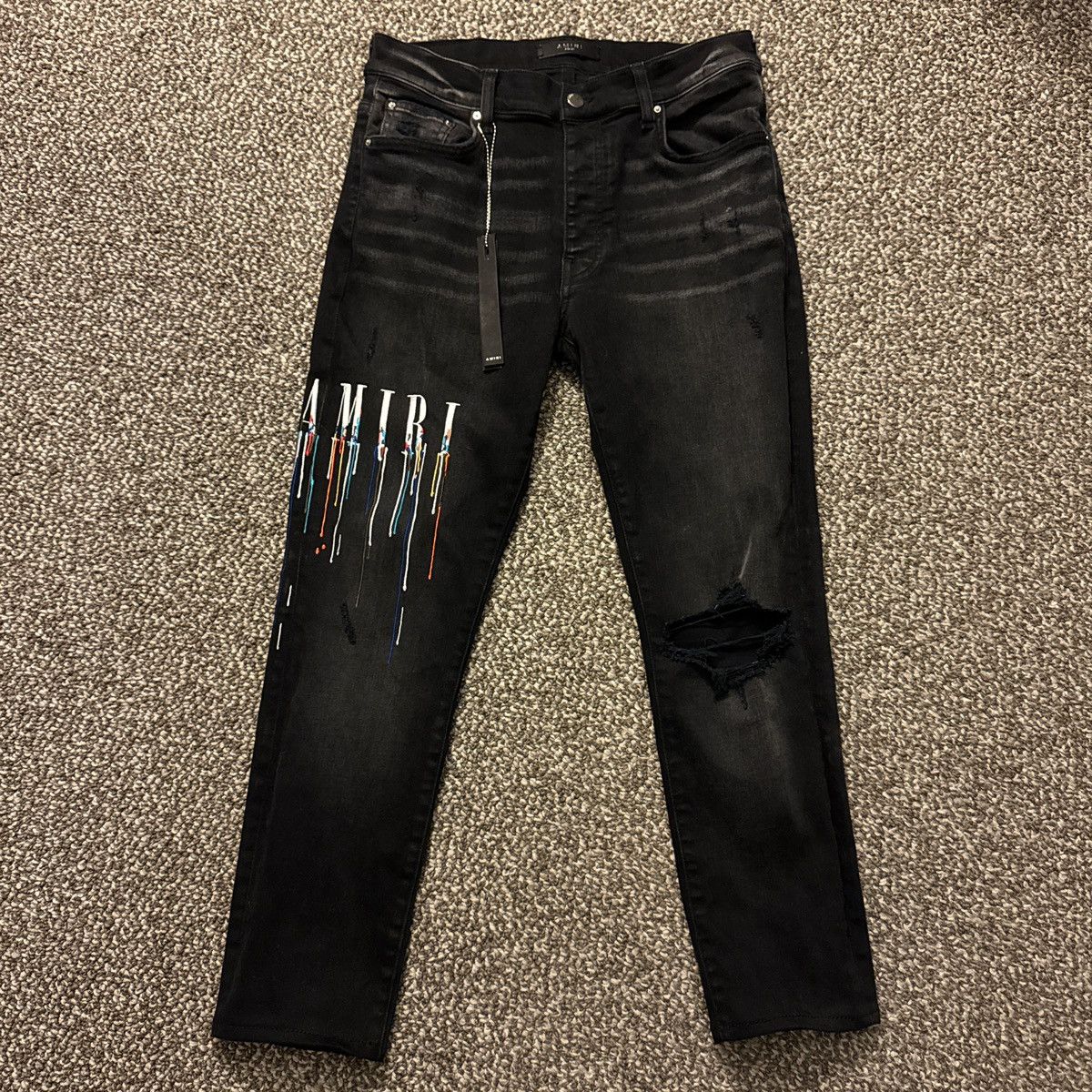 Amiri Paint Drip Logo Jeans