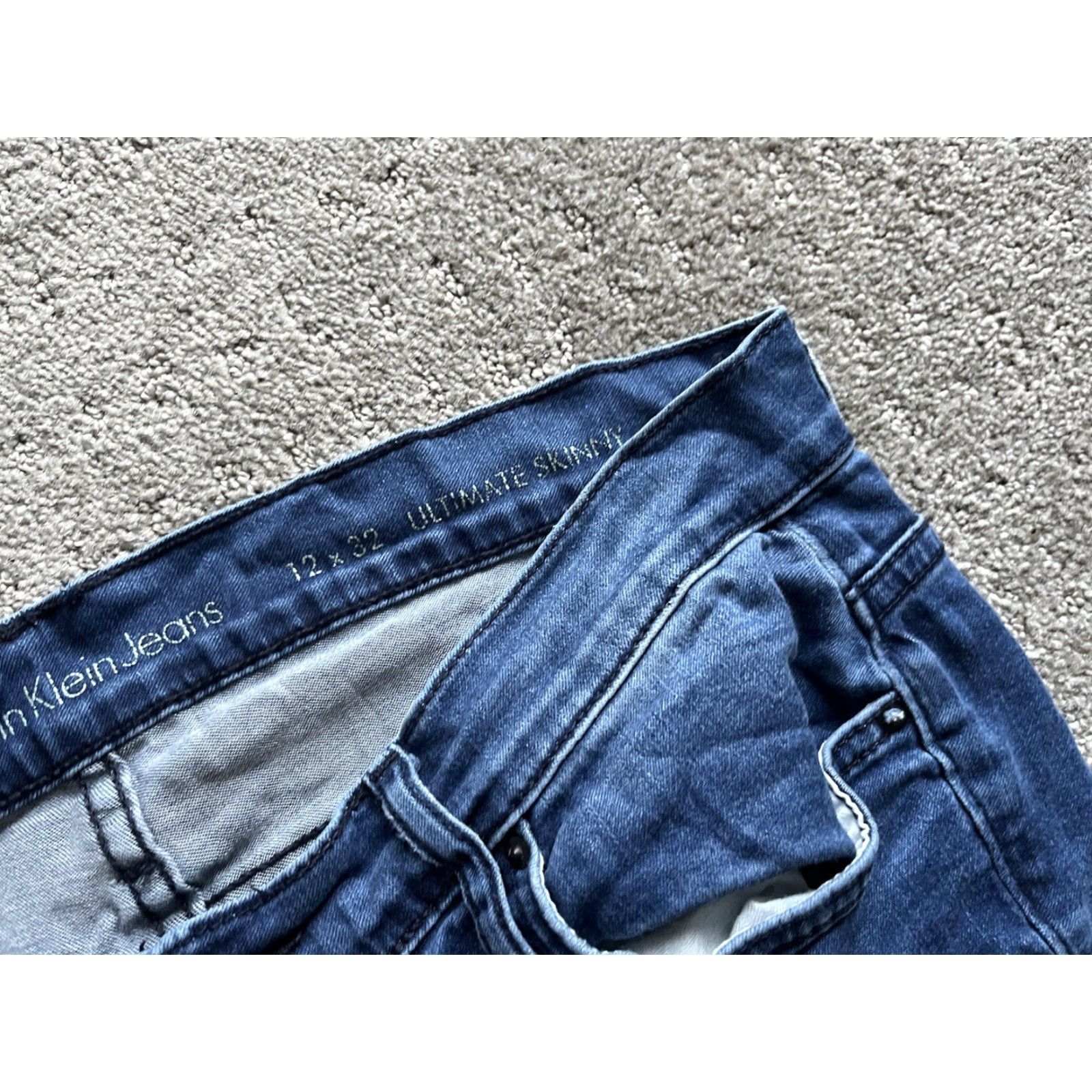Calvin Klein Calvin Klein Jeans Ultimate Skinny Distressed Denim 12 Women 24 Inseam Medium Blue 5-Pocket Leather Logo Zip Fly Regular Size 12 Womens Size 34" / US 12 / IT 48 - 5 Thumbnail