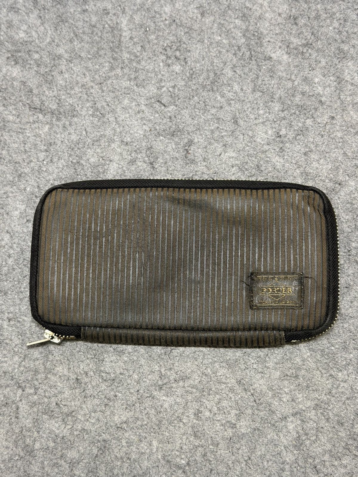 Porter Original Fake x KAWS X Porter wallet | Grailed