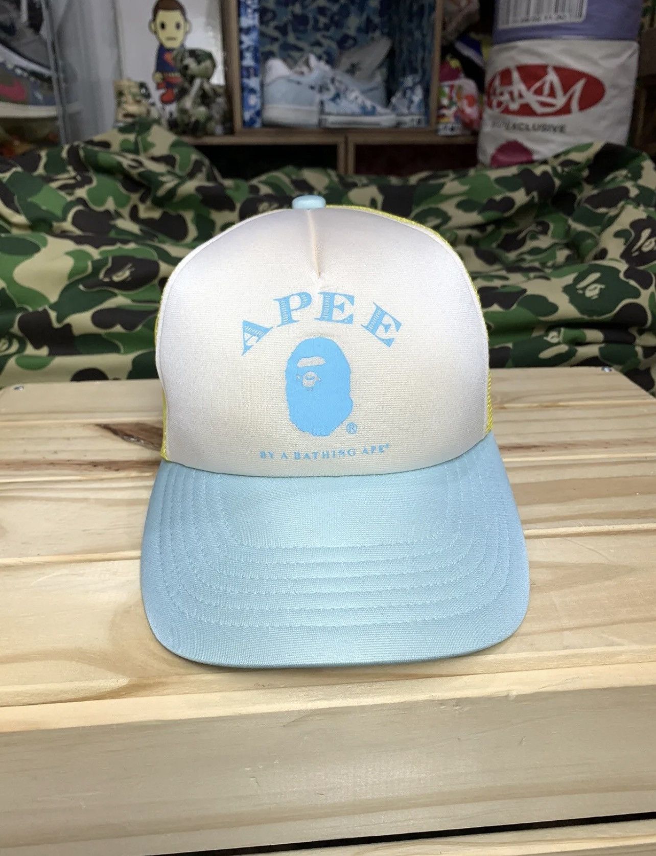 image of Bape x Vintage 00’S A Bathing Ape “Apee” Blue/yellow Trucker Hat, Women's