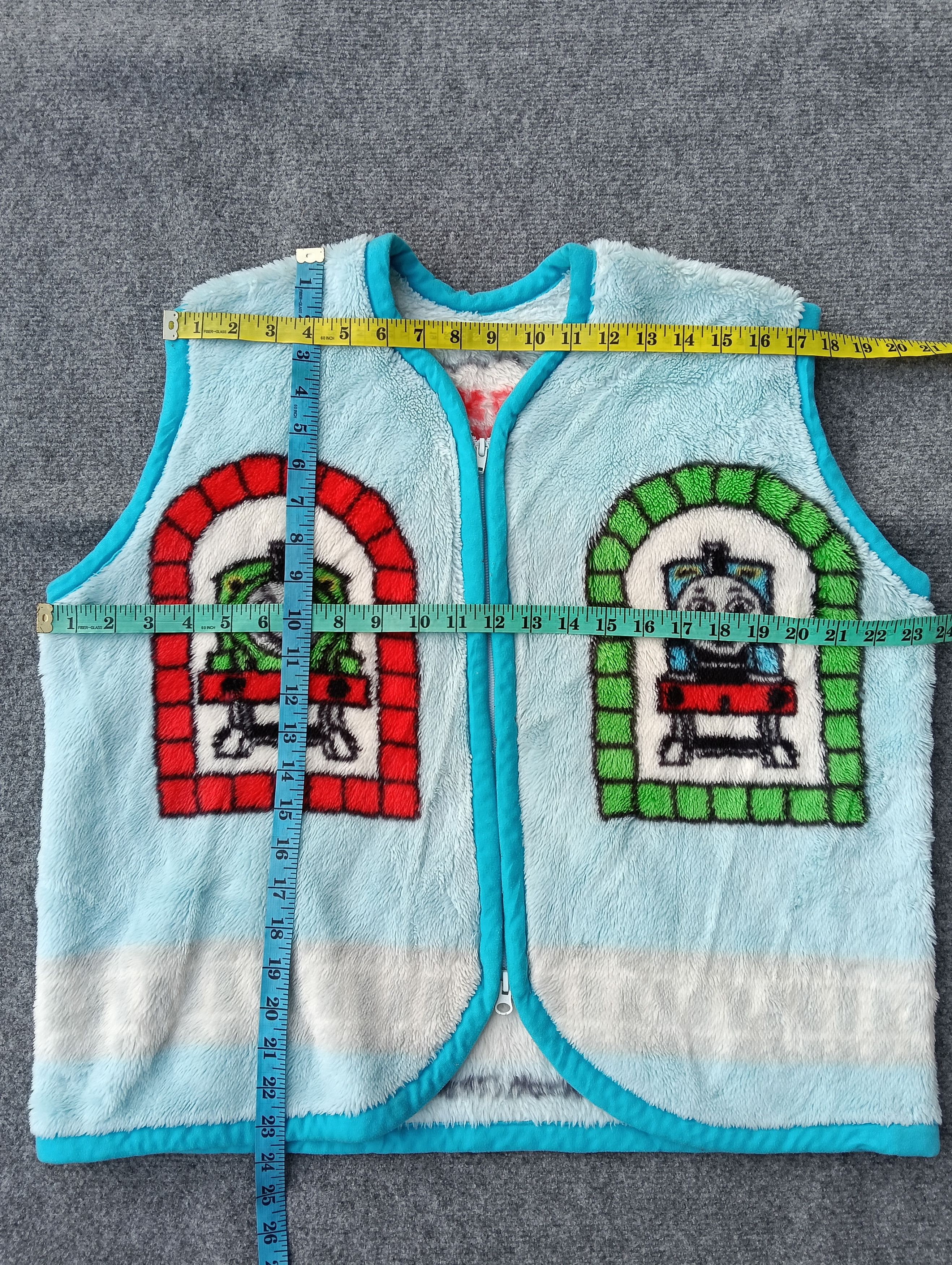Cartoon Network Tommy Thomas fleece vest.copyright 1999. Size US L / EU 52-54 / 3 - 4 Thumbnail