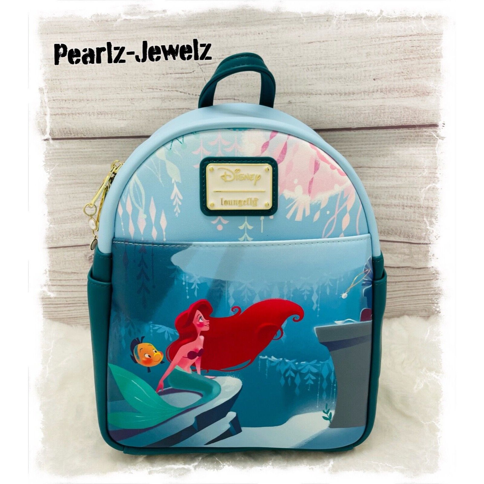 image of Loungefly Disney Little Mermaid Princess Ariel Grotto Pearl in Blue, Women's