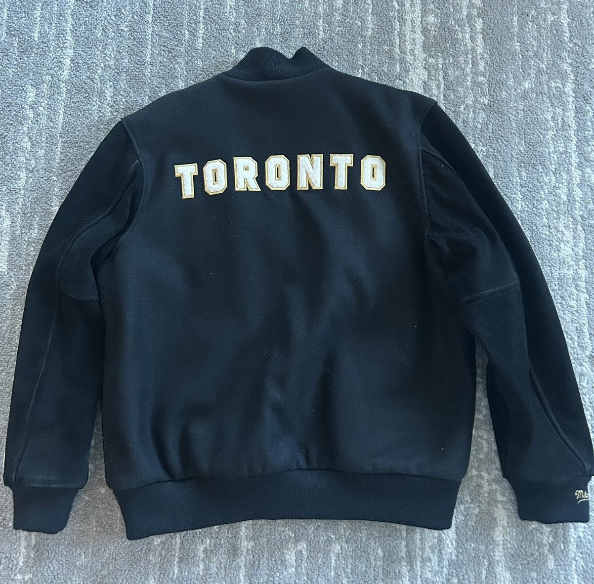 Mitchell & Ness × October's Very Own 2013 OVO x Mitchell&Ness x Toronto Raptors Varsity Size US L / EU 52-54 / 3 - 7 Thumbnail
