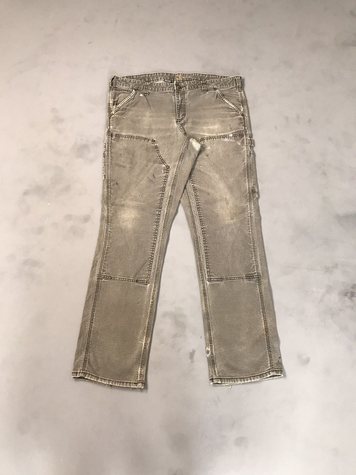 Vintage faded Carhartt double knee damaged workwear denim