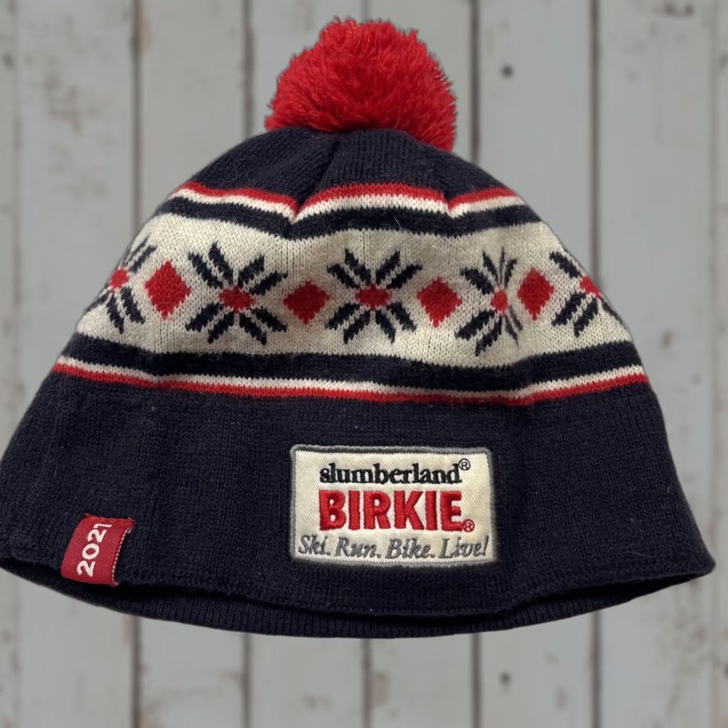 Vintage Slumberland Birkie 2021 Ski Run Bike Live Winter Red Pom Hat Snowflake Nordic Knit Beanie Mens One Size Black Winter Navy Blue Red Accent Size ONE SIZE - 1 Thumbnail
