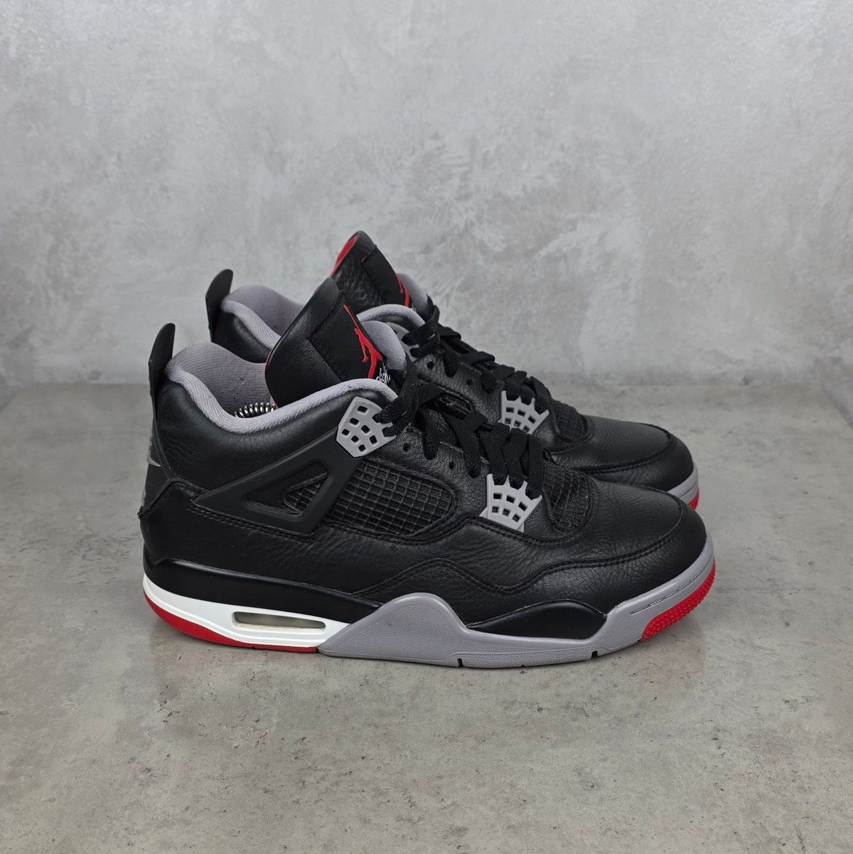 Jordan Brand Air Jordan 4 Bred Retro Black/Red Sneakers Size 42,5 Size US 8 / EU 41 - 1 Thumbnail