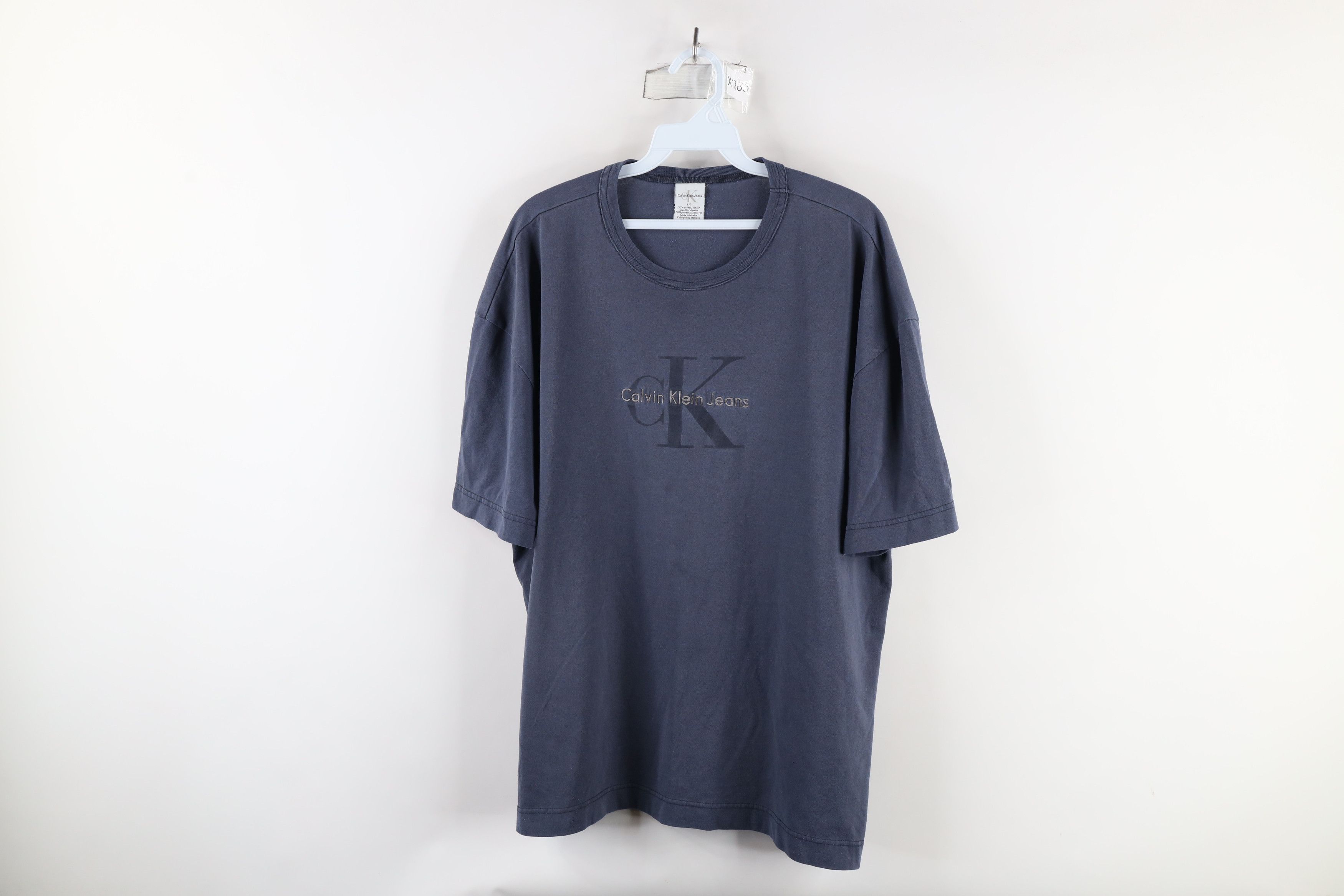 Calvin Klein × Vintage Vintage 90s Calvin Klein Out Big Logo Short Sleeve T-Shirt Size US L / EU 52-54 / 3 - 1 Thumbnail