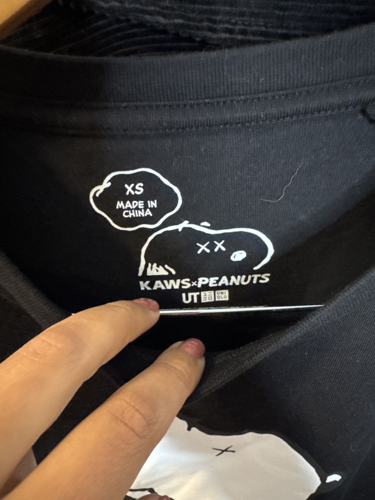 Kaws × Peanuts × Uniqlo Uniqlo x Kaws x Peanuts - XS - black Snoopy Skateboard tee Size US XS / EU 42 / 0 - 3 Thumbnail