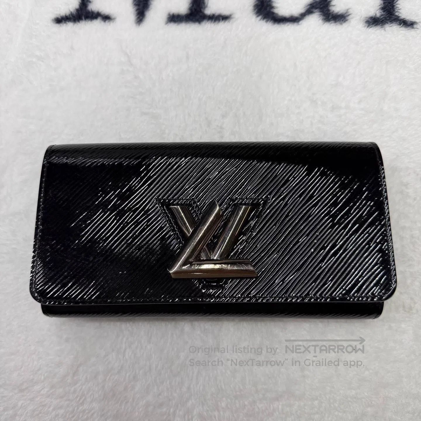 Louis Vuitton Black Textured Wallet with Metallic Logo Accent. Size ONE SIZE - 1 Thumbnail