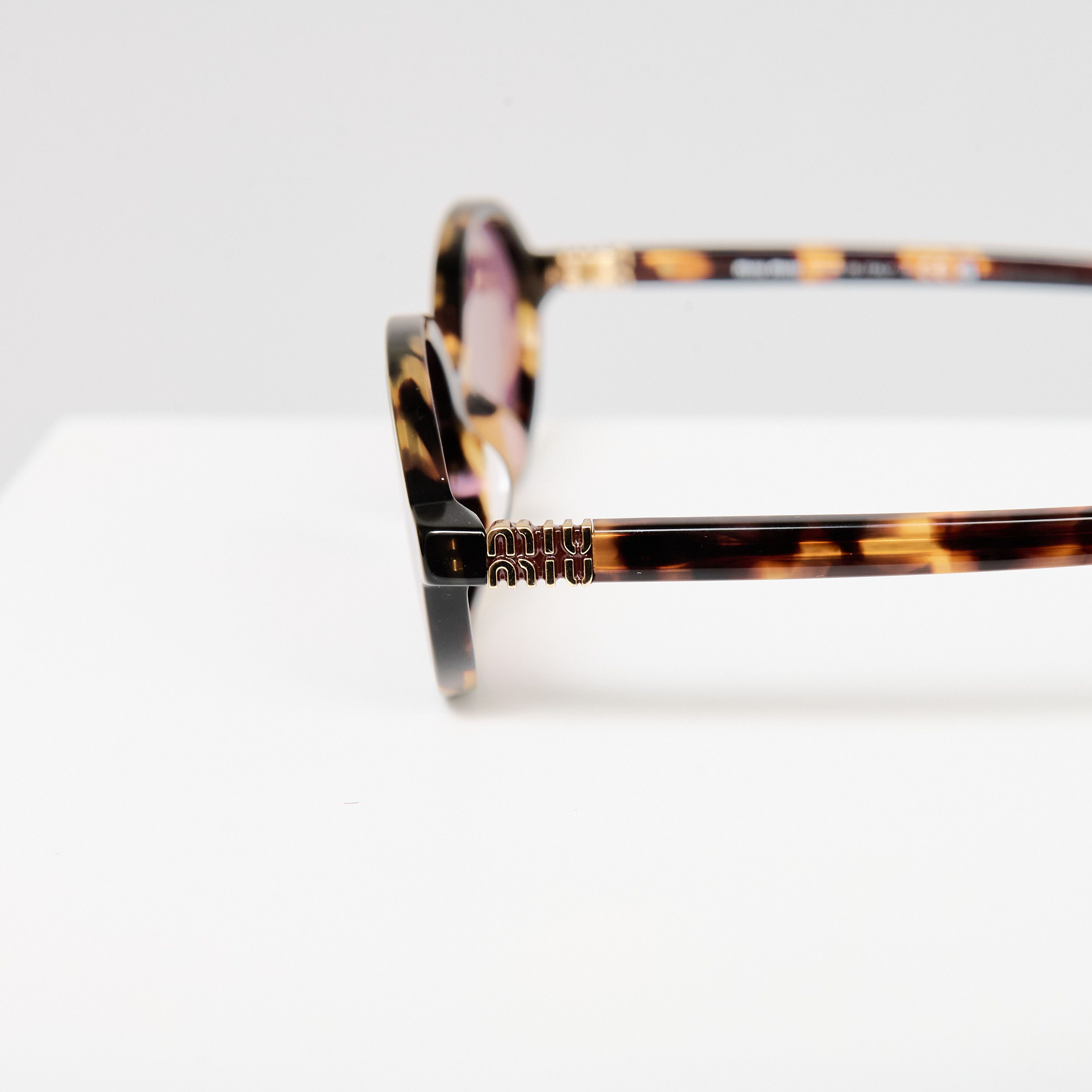 Miu Miu MIU MIU MU 04ZS VAU50D Eyewear HONEY Size ONE SIZE - 3 Thumbnail