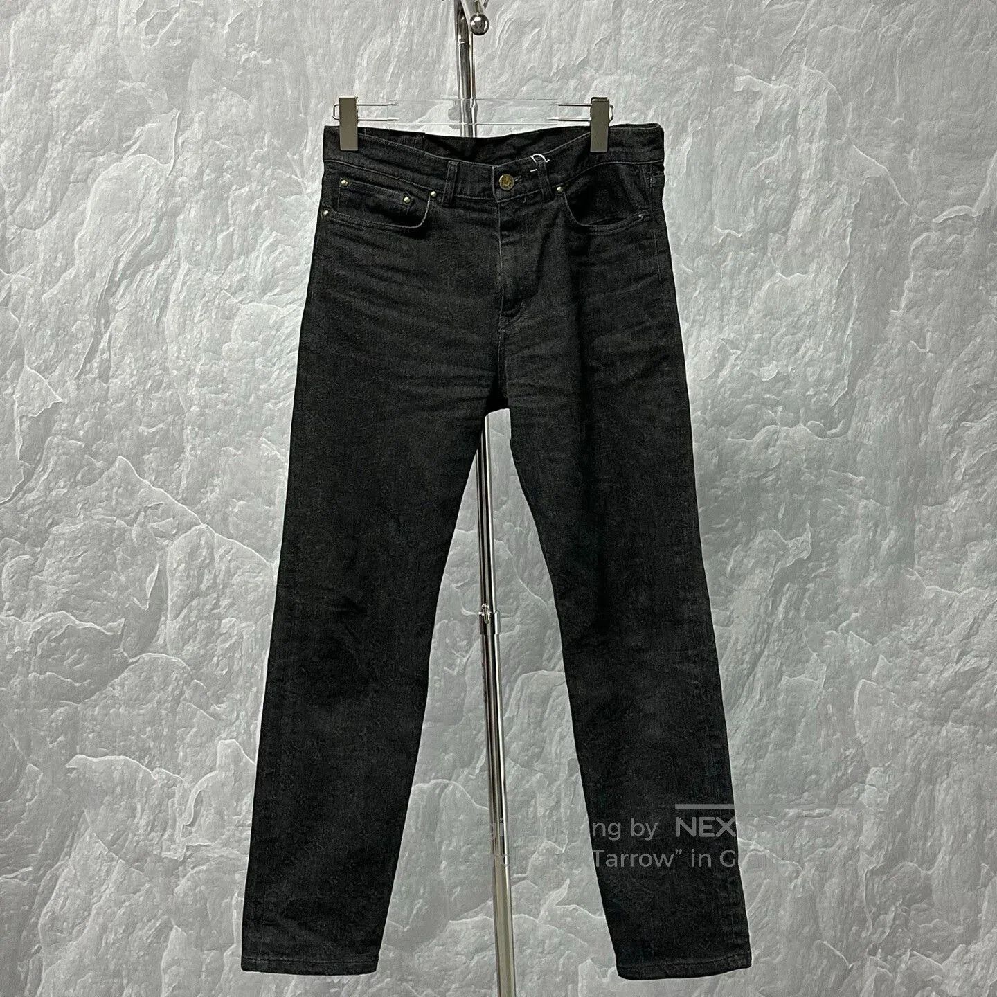 louis vuitton denim pants with logo print.