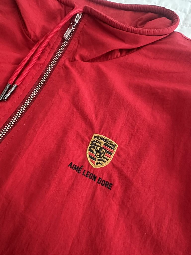 Aime Leon Dore × Porsche Design Aime Leon Dore Porsche Nylon Track Jacket Men’s Tango Red Size US XL / EU 56 / 4 - 6 Thumbnail