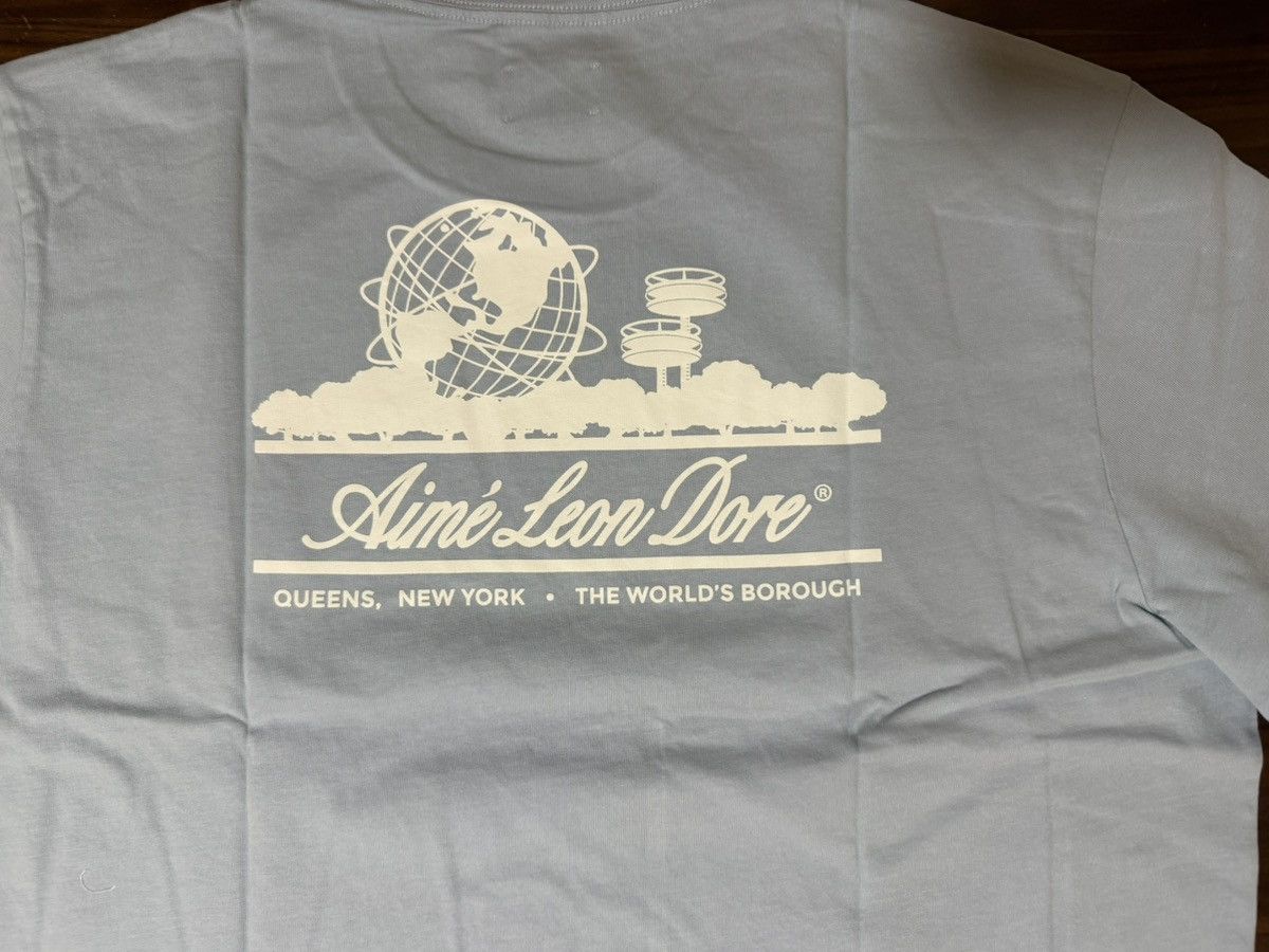 Aime Leon Dore Aime Leon Dore ALD Unisphere Tee T-Shirt Kentucky Blue XXL Size US XXL / EU 58 / 5 - 10 Thumbnail