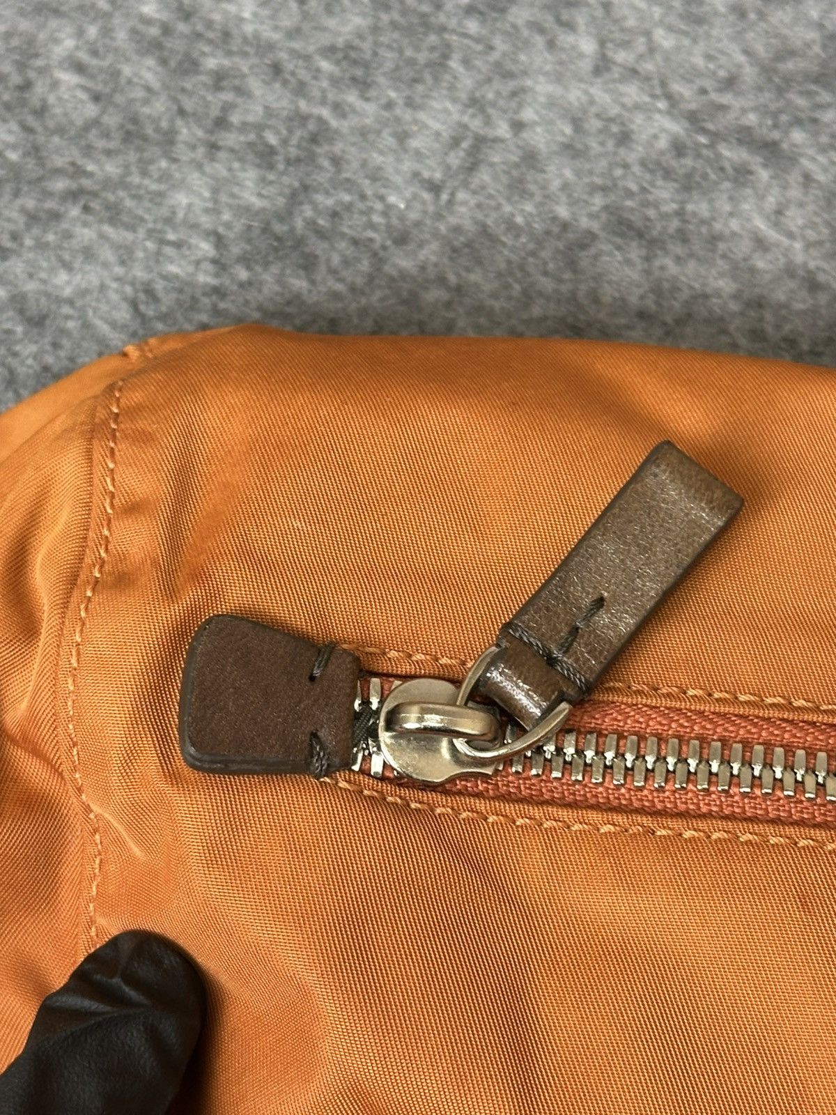 Tumi Tumi Voyageur Basel Backpack in a burnt orange nylon. Size ONE SIZE - 12 Thumbnail