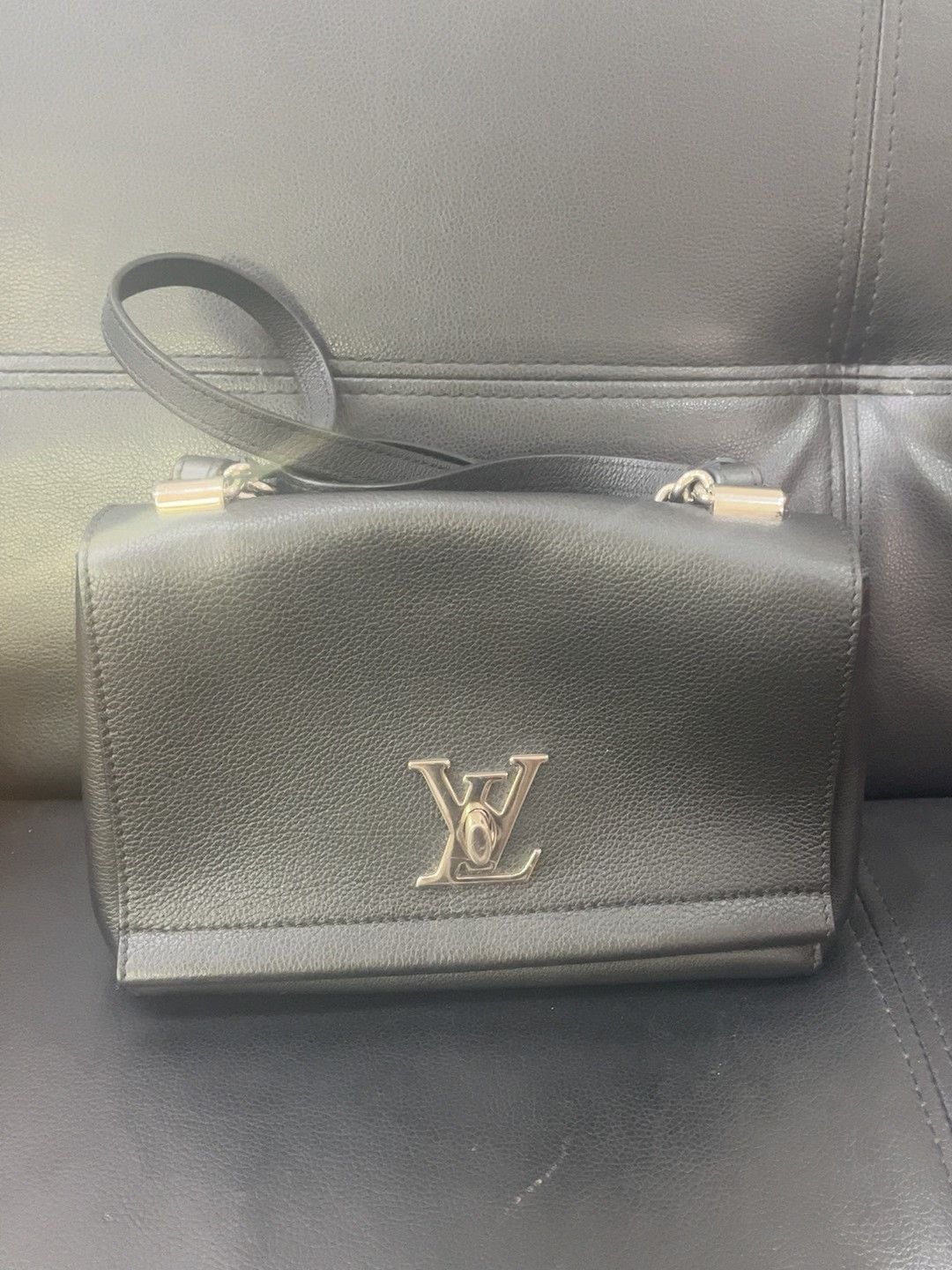 Louis Vuitton LV Black Button Rotating Bag Size ONE SIZE - 1 Thumbnail