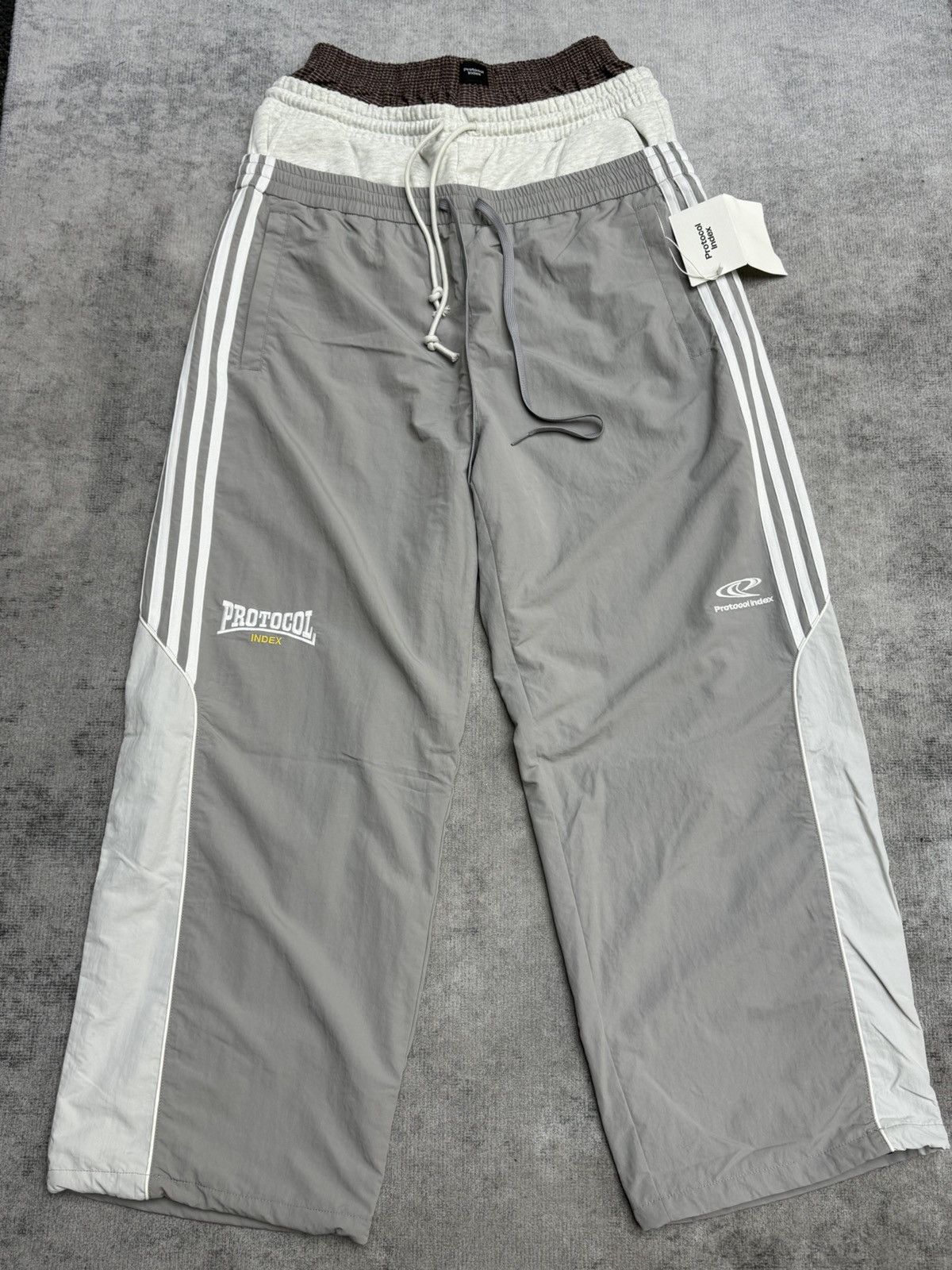 PROJECT G/R PROTOCOL INDEX 3 LAYERED TRACK PANTS - GREY | Grailed