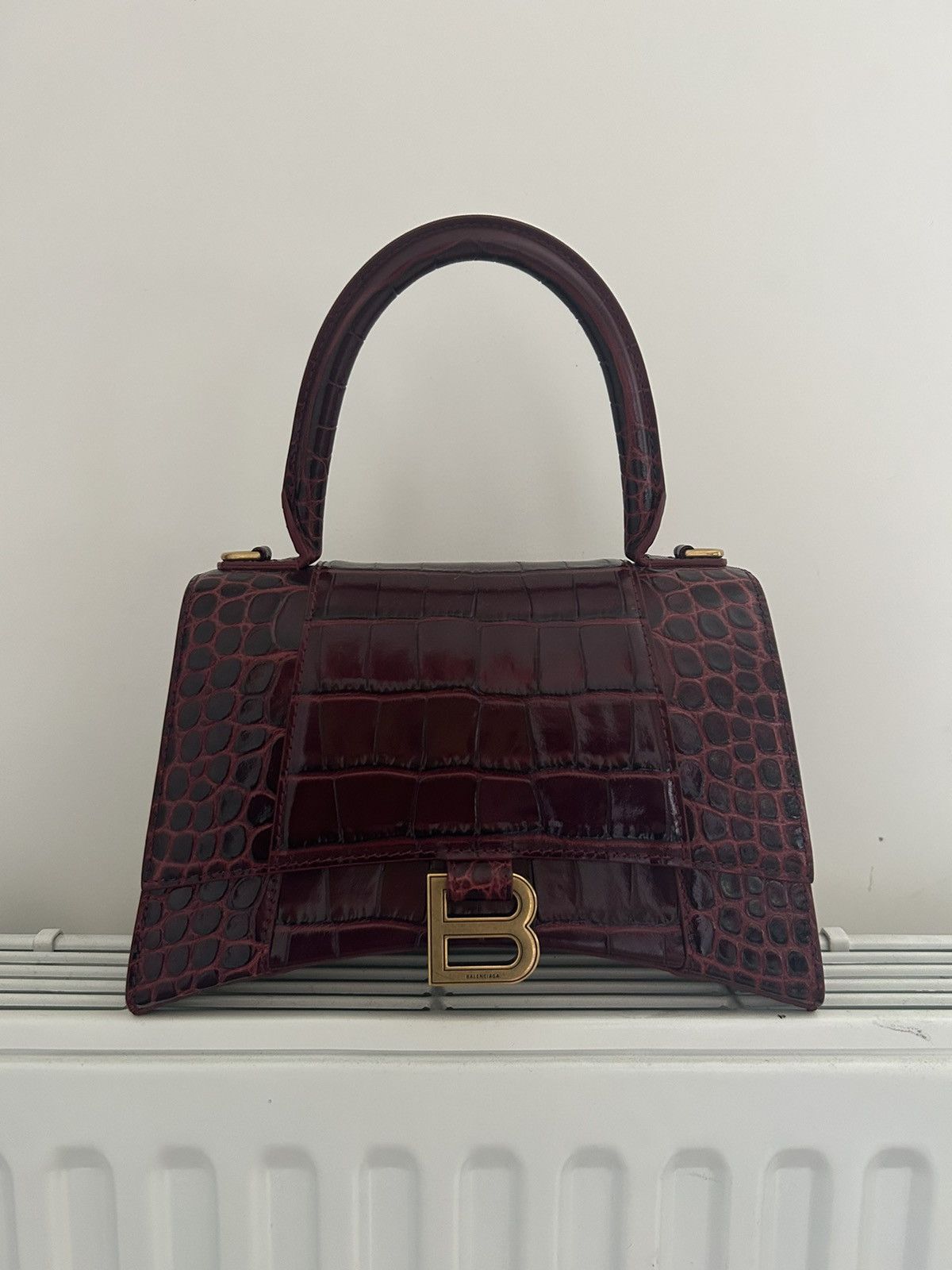 image of Hourglass Balenciaga Bag In Burgendy Croc in Red, Women's