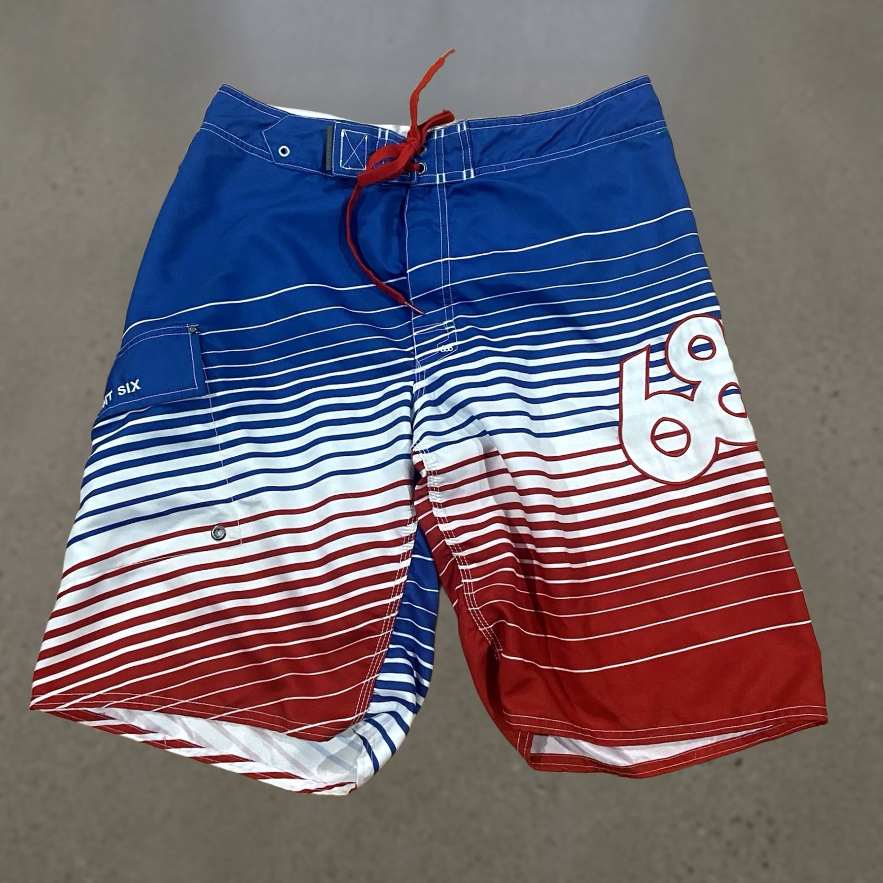 686 686 Mens Board Short Swim Bottom 34 Multicolor American Flag 100% Polyester Above-the-Knee Drawstring Pockets Hook & Loop Fly Regular Mens Size US 34 / EU 50 - 1 Thumbnail