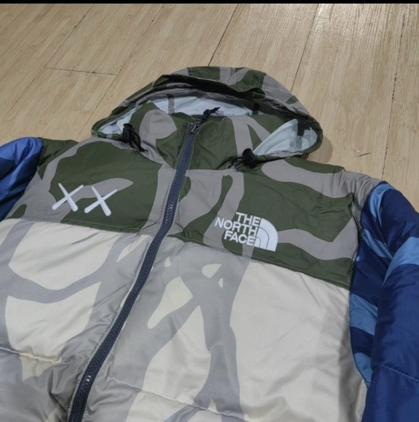 Kaws × The North Face KAWS X THE NORTH FACE 1996 NUPTSE JACKET MONTEREY BLUE Size US L / EU 52-54 / 3 - 6 Thumbnail