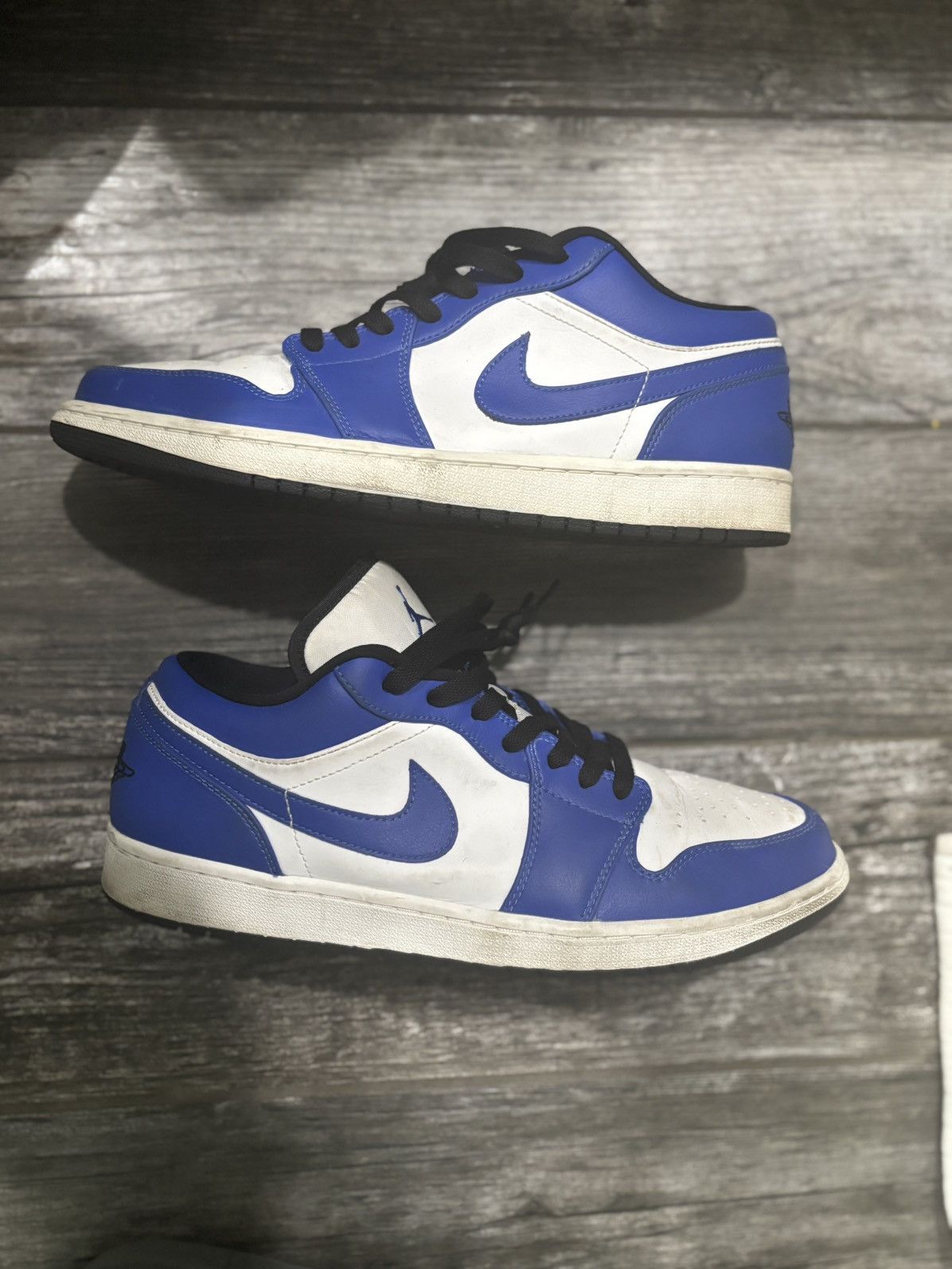 Nike Air Jordan 1 Low in a royal blue and white colorway.