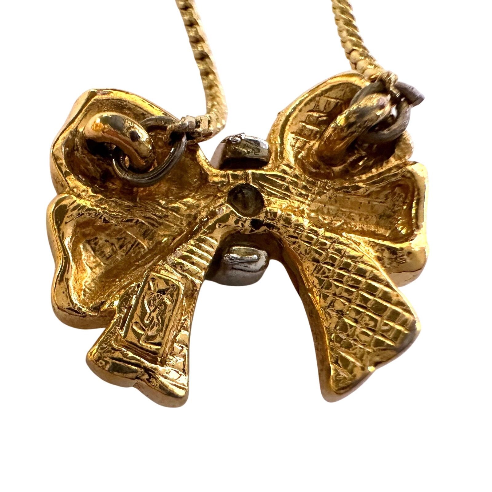 Yves Saint Laurent Yves Saint Laurent Gold and Rhinestone Bow Necklace Size ONE SIZE - 3 Thumbnail