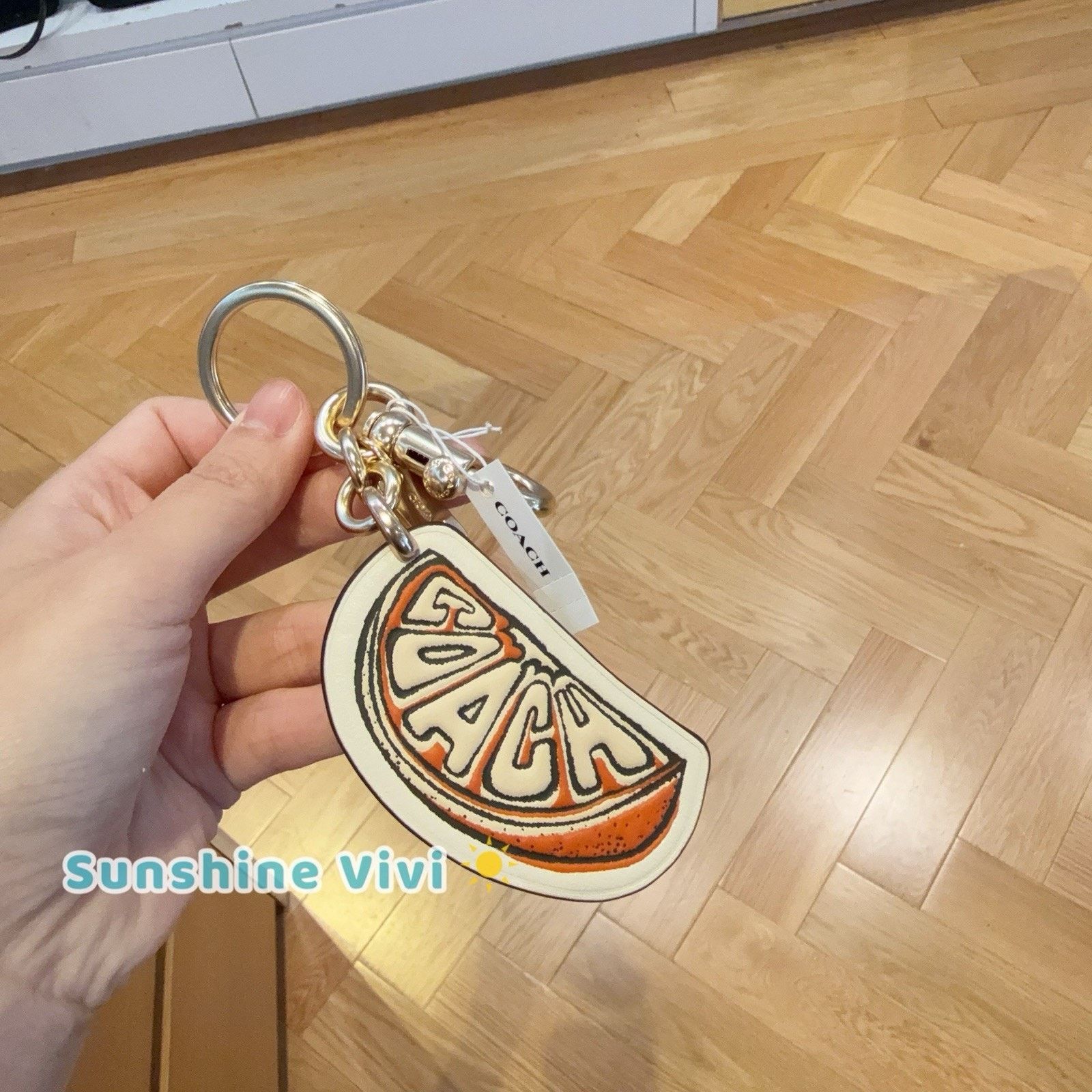 Coach NWT Coach Orange Bag Charm Keychain Gold Chalk Orange CA054 Size ONE SIZE - 1 Thumbnail