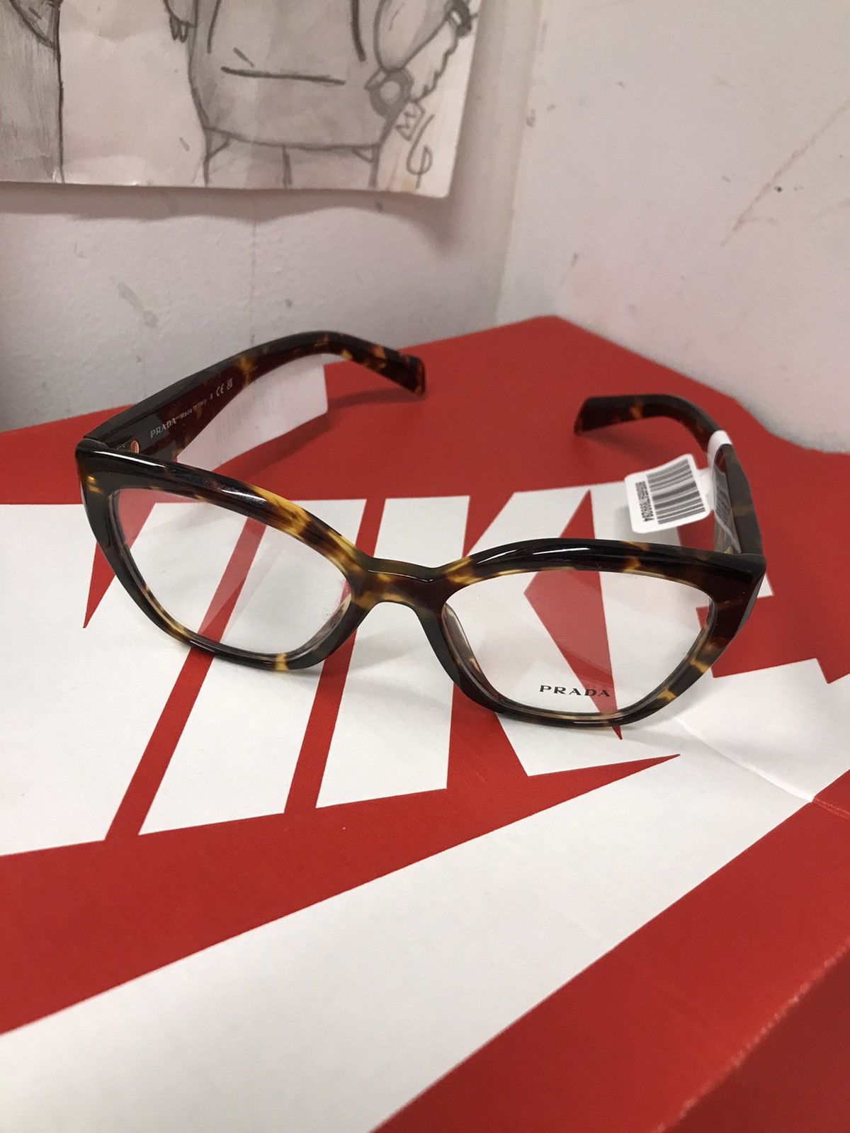 image of Prada Clear Glasses in Brown, Women's