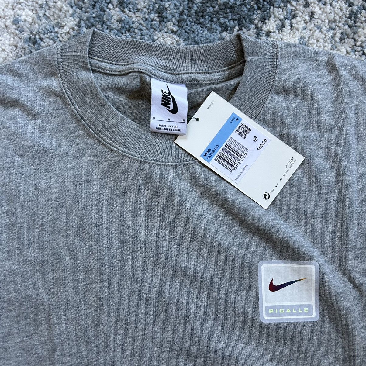 Nike × Pigalle 2019 THE POWER OF SPORT TO MOVE THE WORLD TEE HEATHER SAiL Size US M / EU 48-50 / 2 - 5 Thumbnail
