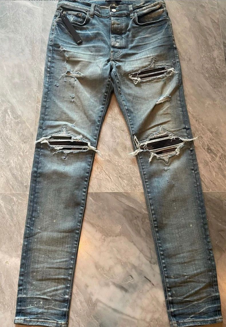 Amiri camouflage patched blue denim pants
