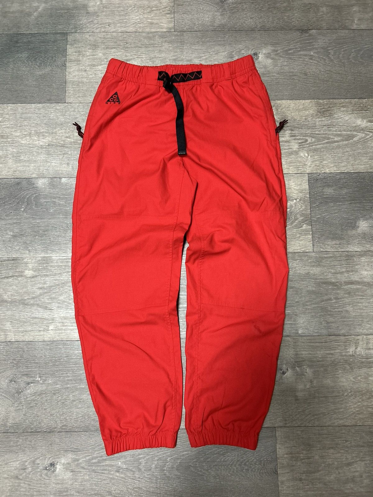 image of Sweatpants Nike Acg in Red, Men's (Size 30)