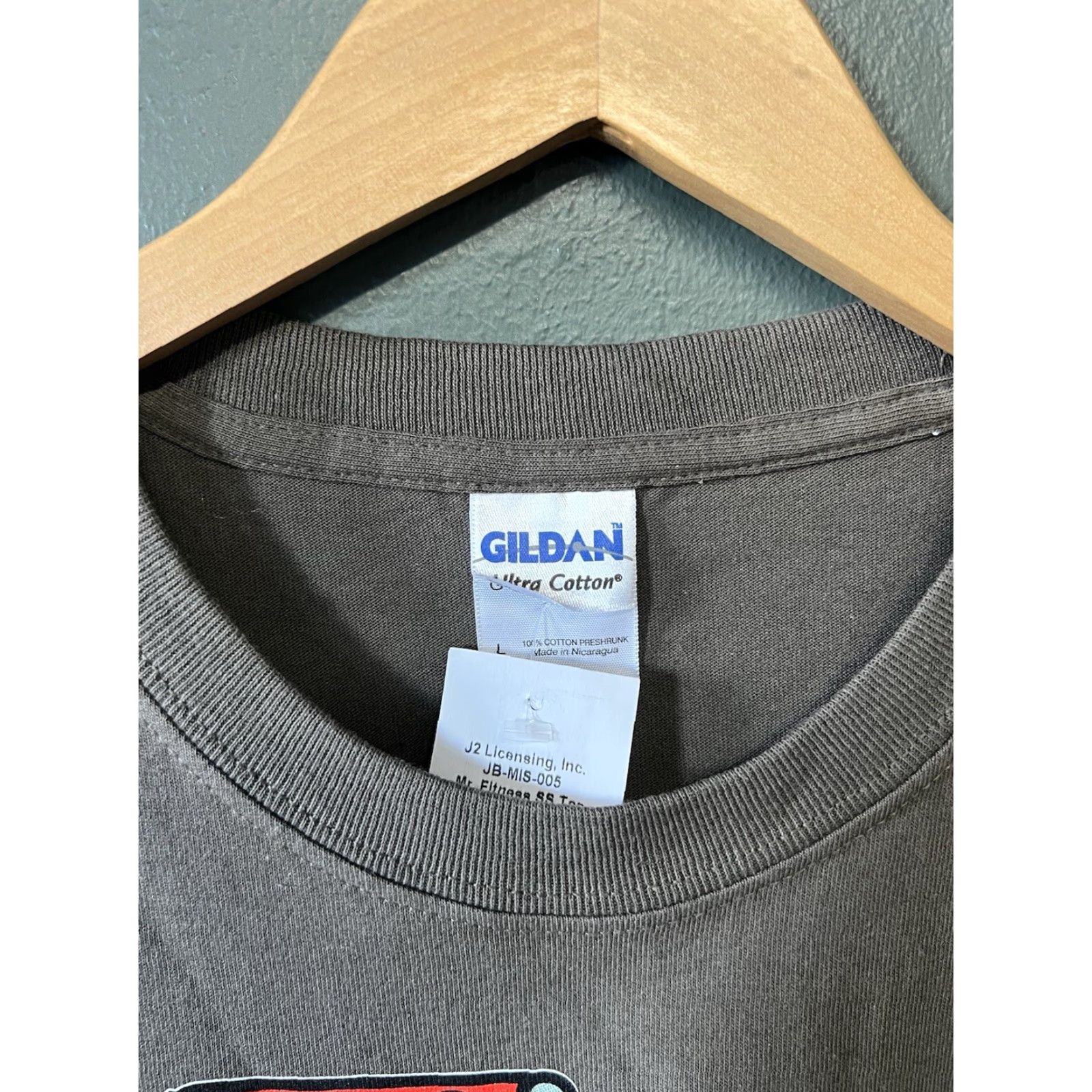 Vintage Y2K Jim Benton Mens Brown Short Sleeve T-shirt Large NWT Size Large Brown T-Shirt Mens Y2K Mr. Fitness NWT Size US L / EU 52-54 / 3 - 3 Thumbnail