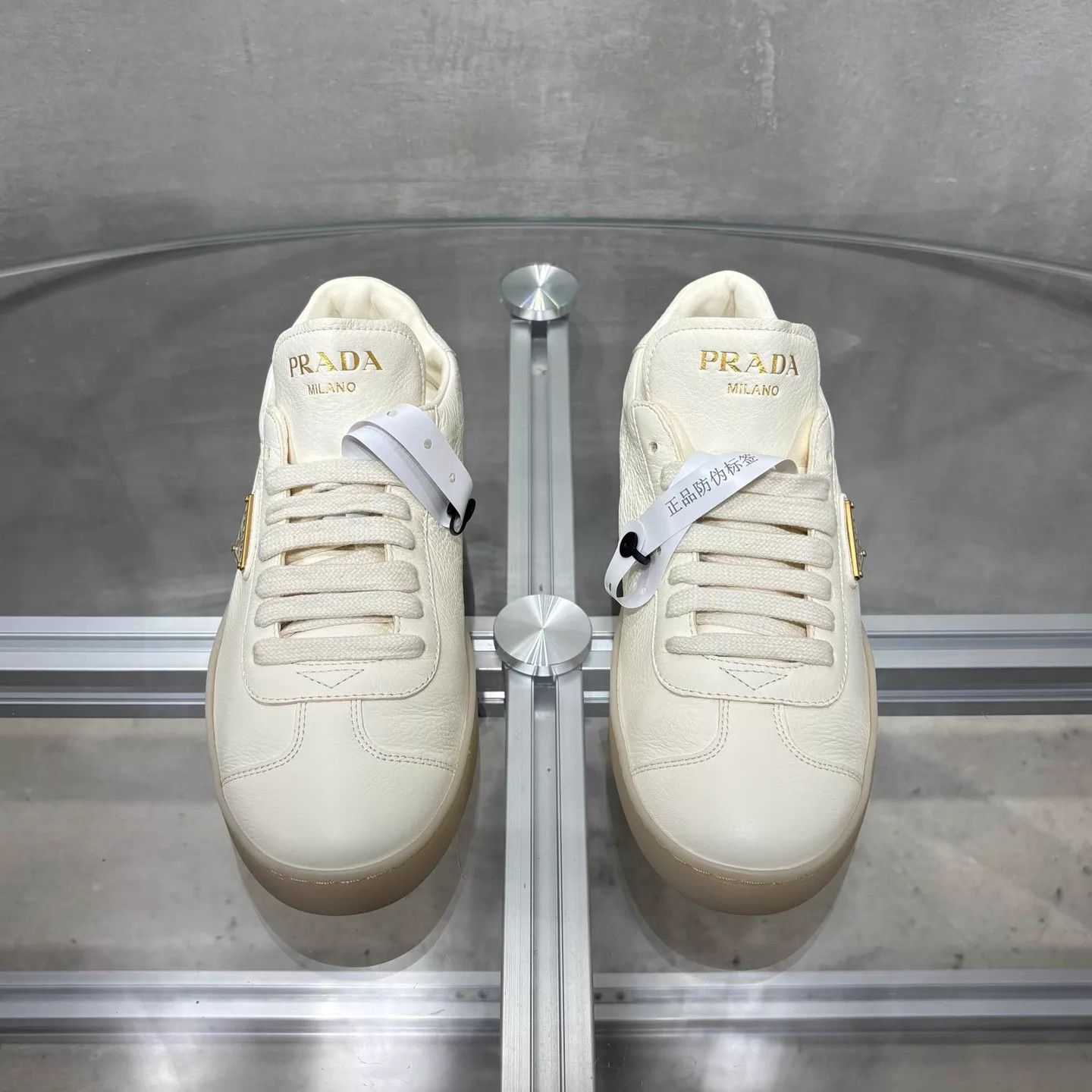 Prada Prada Cream Leather Triangle Logo Trainer Women's 37 Size US 6.5 / IT 36.5 - 1 Thumbnail