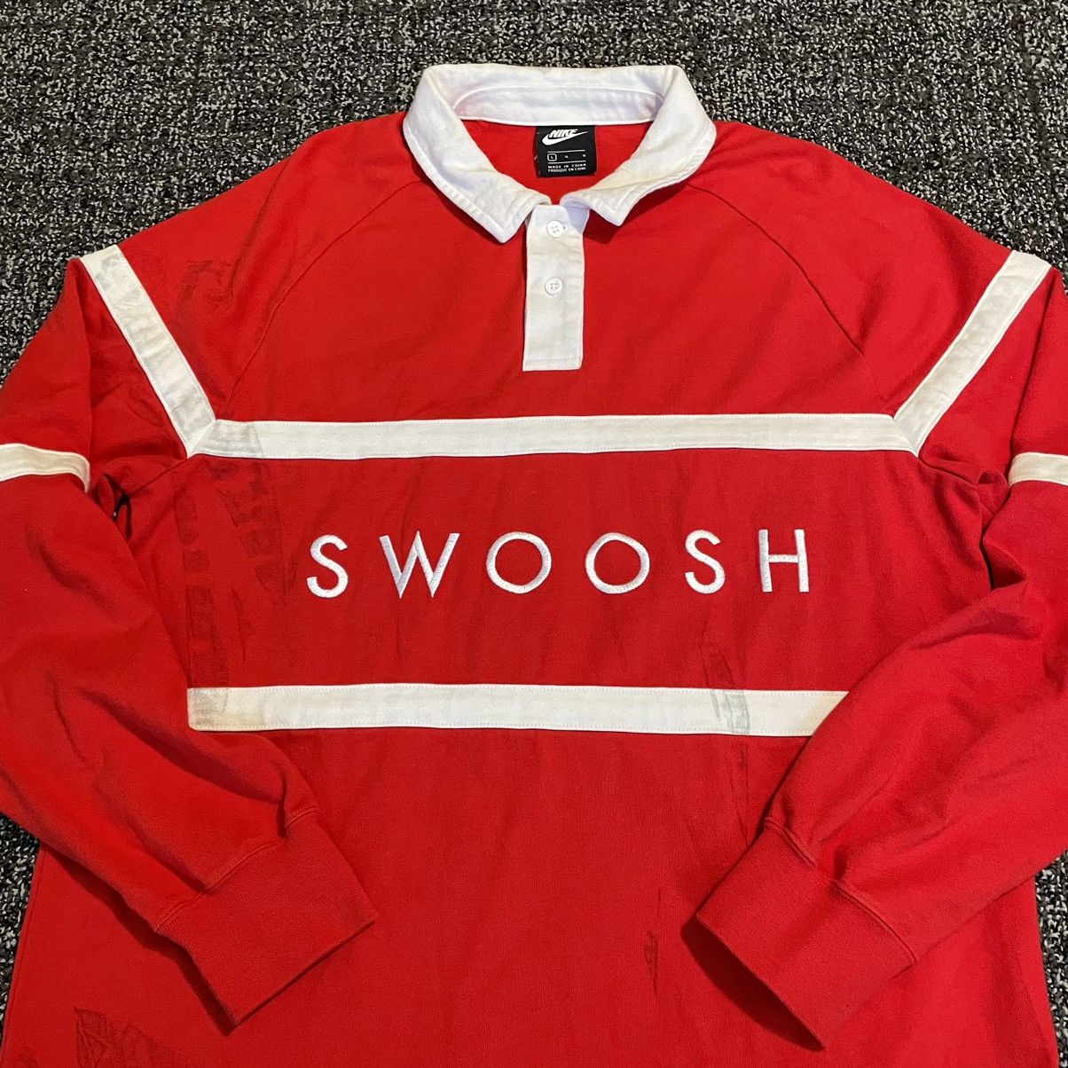 swoosh nike rugby shirt