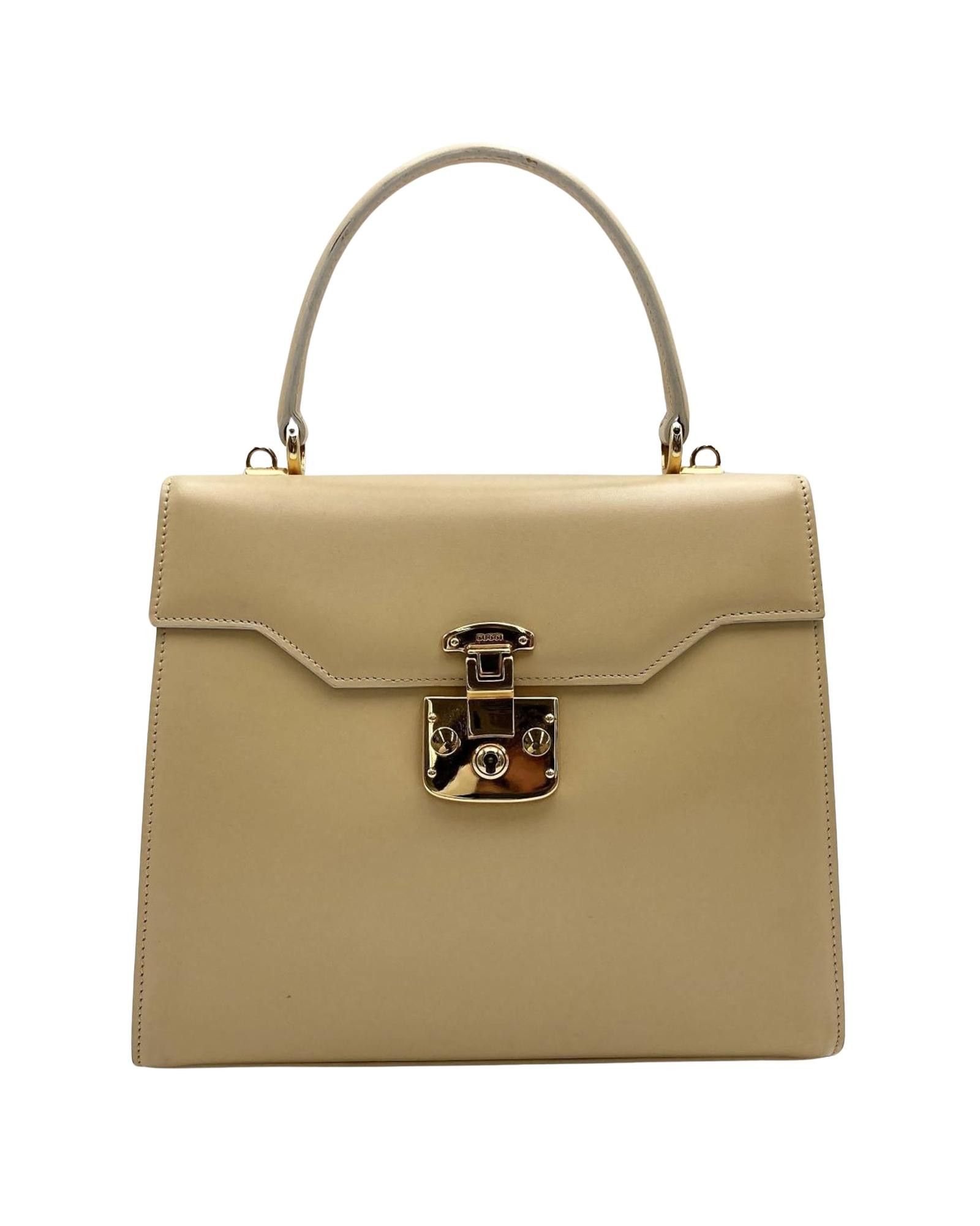 image of Gucci Sophisticated Beige Leather Handbag With Iconic Closure, Women's