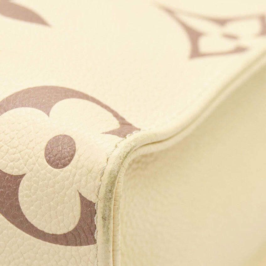 Louis Vuitton Louis Vuitton Empreinte Monogram Giant Onthego PM Creme Size ONE SIZE - 7 Thumbnail