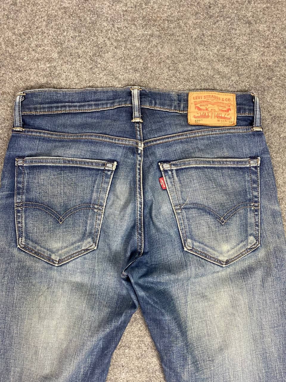 levis 527 bootcut flare distressed denim