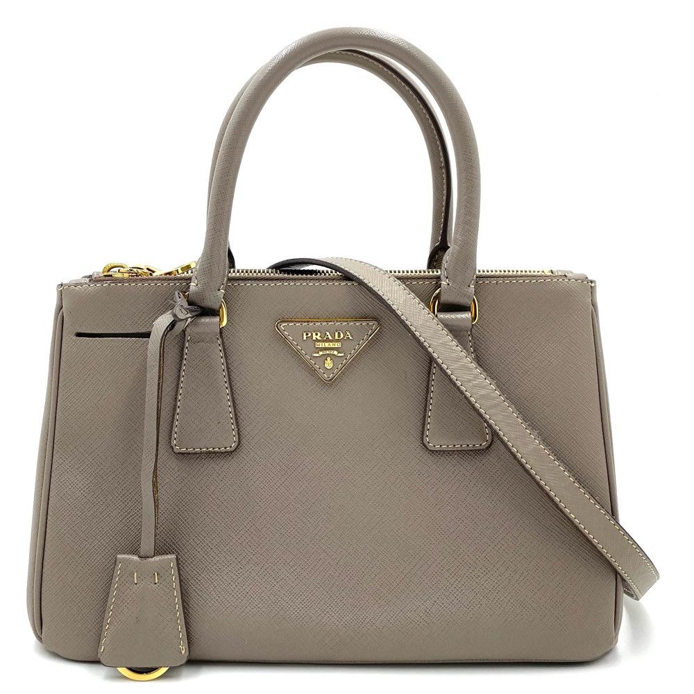 image of Prada 2Way Galleria Handbag Shoulder Triangle Logo Saffiano Leather Greige Gold Hardware in Black, 