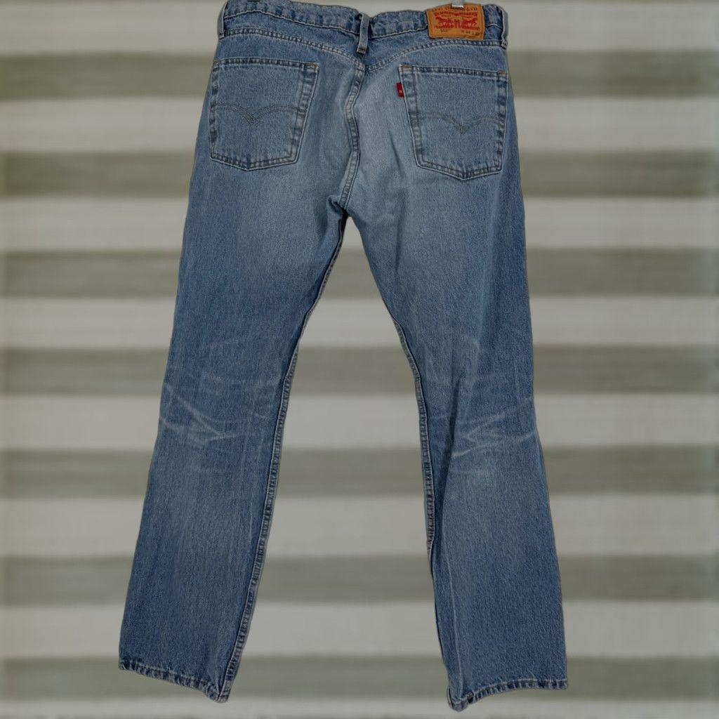 Levi's Levi's 501 Mens Jeans Blue Light Wash Distressed Button Fly Cotton Denim 34x32 5-Pocket Casual Streetwear 90s Grunge Mens Size US 34 / EU 50 - 1 Thumbnail