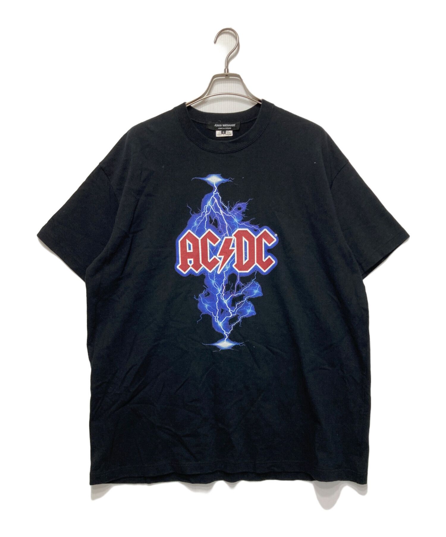 JUNYA WATANABE COMME des GARCONS◆JUNYA WATANAAC/DC LOGO PRINT T-SHIRT/Tシャツ/S/コットン/BLK/JH-T001 Comme des Garcons × Junya Watanabe JUNYA WATANABE COMME des